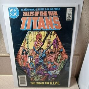 DC Tales of the Teen Titans Comic with Blue and Orange Cover